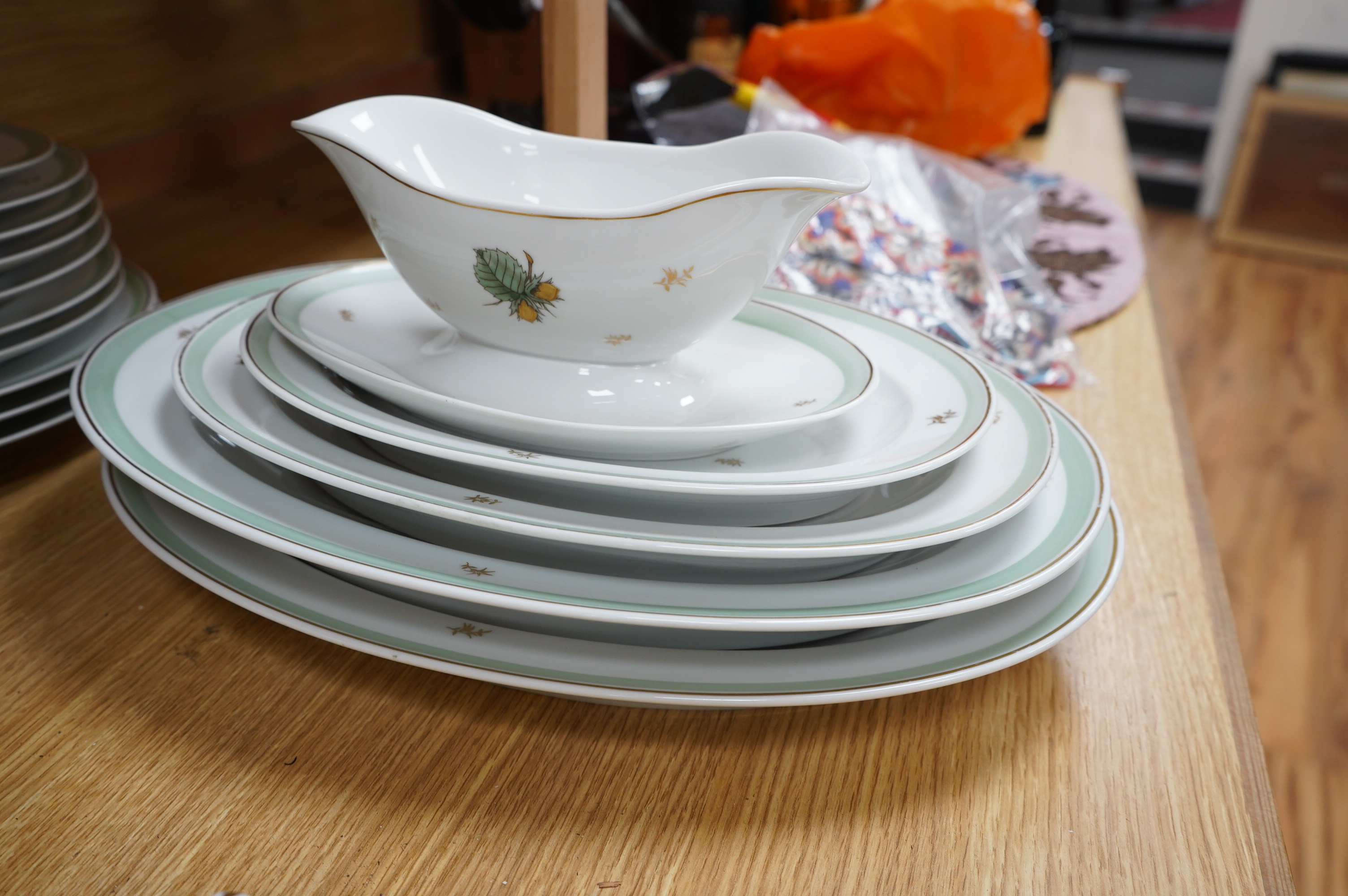 A Bing & Grondahl part dinner service, to include platters, tureens and plates, largest 40cm wide. Condition - good